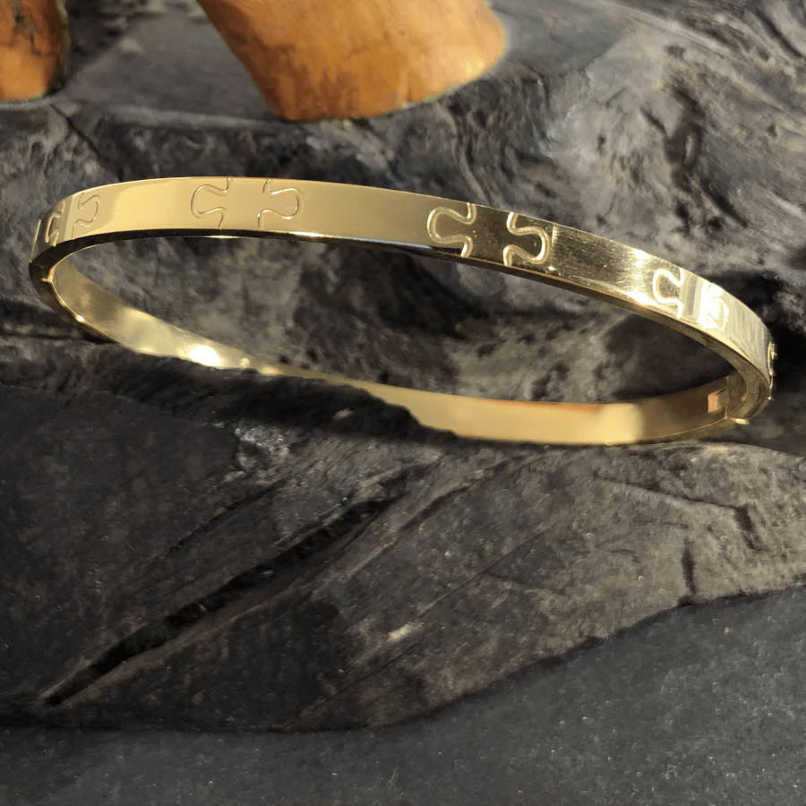 Stainless Steel Bangle Yellow Gold Coloured Oval with Jigsaw Motif