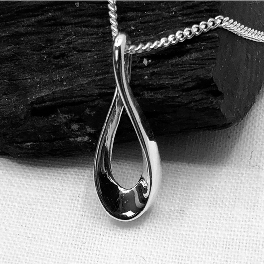 Sterling Silver Infinity Pendant on a Silver Curb Chain