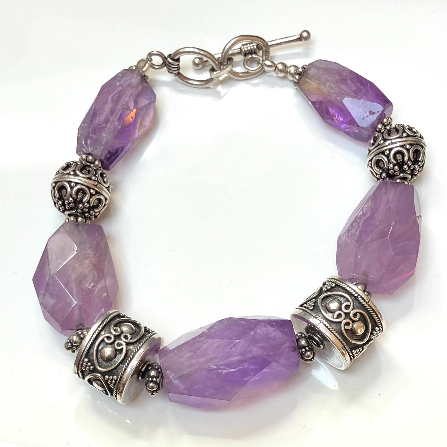 Amethyst and Sterling Silver Bracelet with 5 Cut Stones and 4 Oxidised Silver Beads