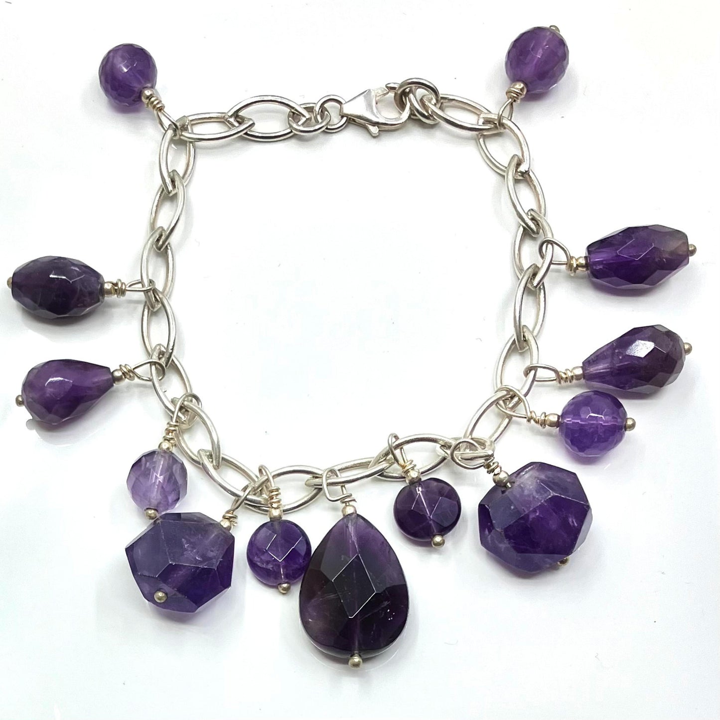 Amethyst and Sterling Silver Bracelet with 13 Cut Stone Charms