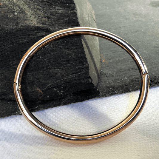 Stainless Steel Bangle Rose Gold Coloured, Hinged Oval