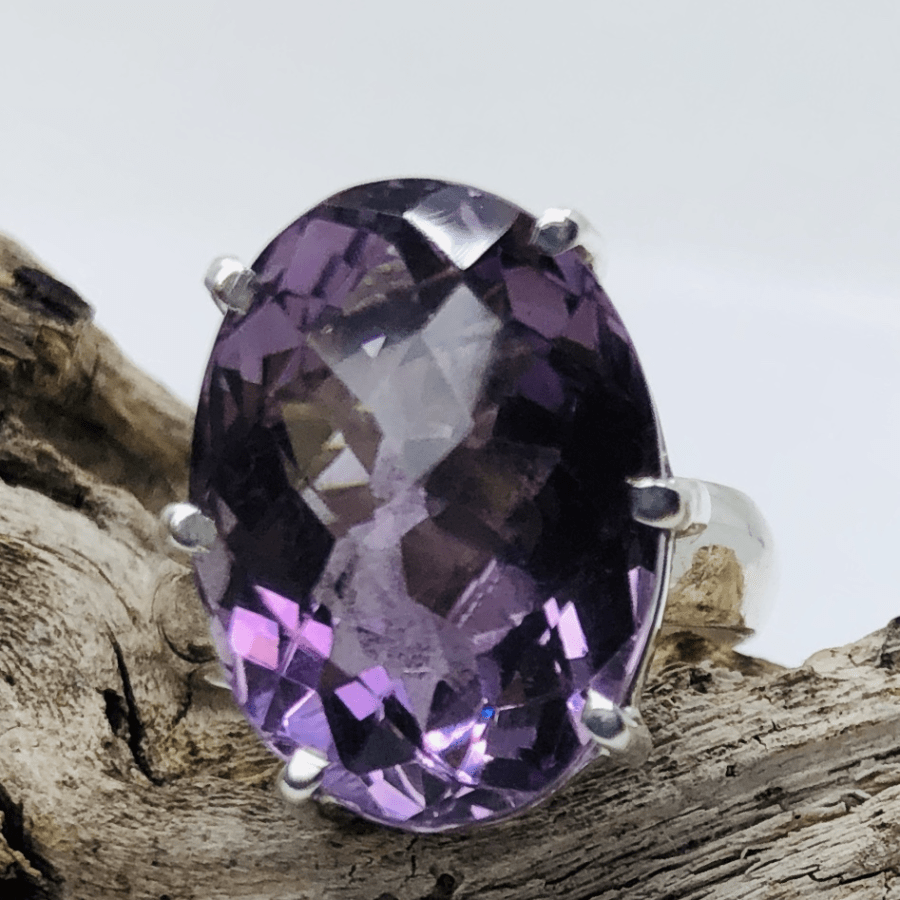 Amethyst and Sterling Silver Oval Cut Stone Claw Ring