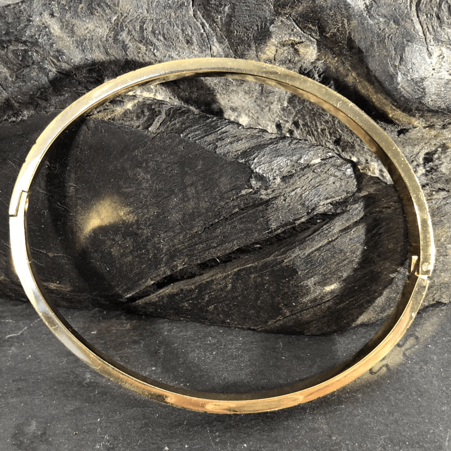 Stainless Steel Bangle Yellow Gold Coloured Oval with Jigsaw Motif